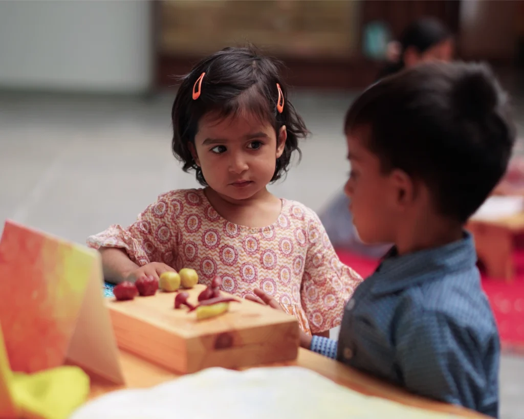 Kids playing thraya school